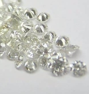 0.19 TCW white various round diamonds