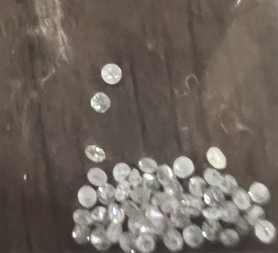 0.31 TCW white various round diamonds