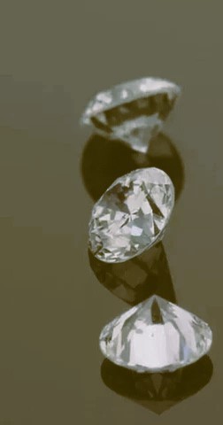 0.04 TCW white round 3 diamonds