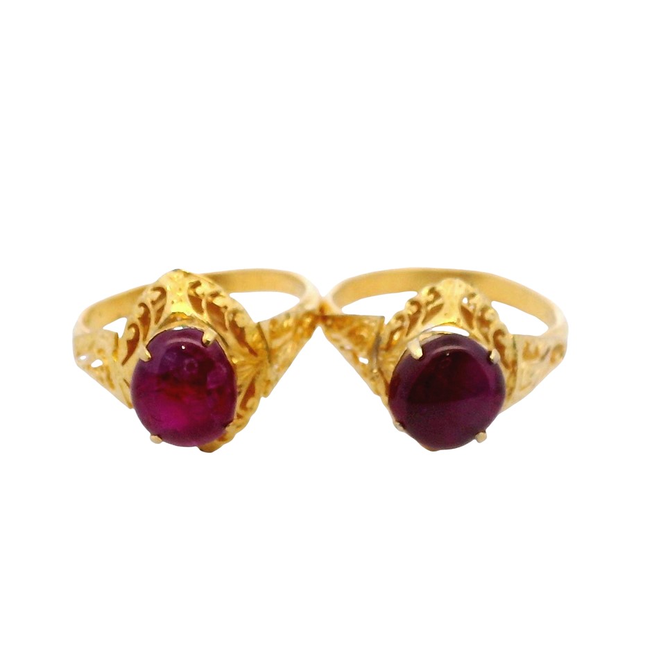 Two (2) Gold-Plated Rings - Cabochon Cut Reddish Purple Natural Corundum.