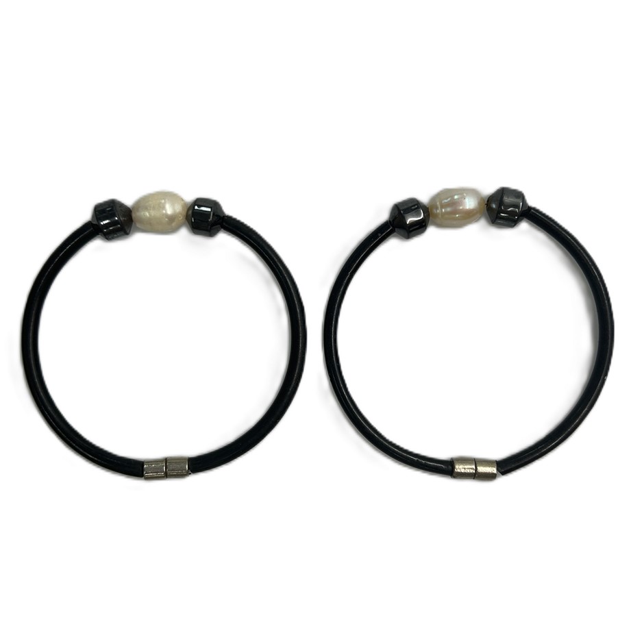 Pair Of Black Flexible Tubing Bracelets