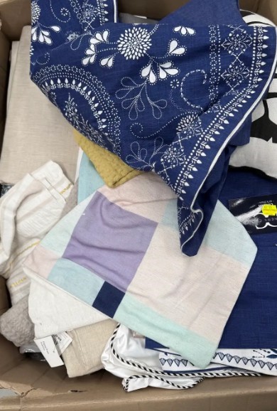 Assorted Box of Linen Clothes, Curtains etc. NB: Items may not be in origin