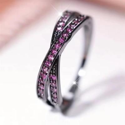 Designer Pink Simulated Diamond Crossover Ring in Black - US Size 8