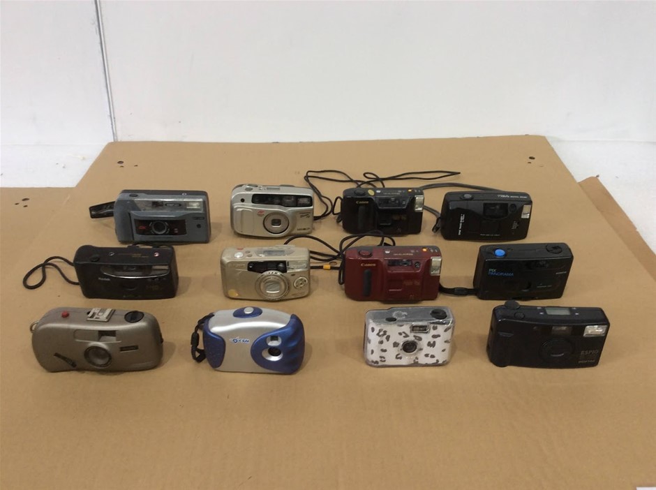 Mixed Brand Film Cameras (Canon, Kodak, Minolta, Olympus) - (Lot of 12)