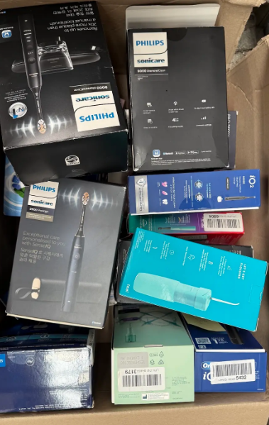 Assorted Box of Toothbrushes and Accessories. NB: Items may not be in origi