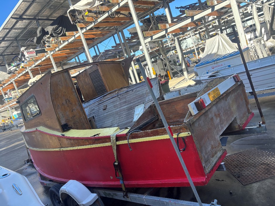 <p>Unknown Make and Model Boat and Trailer</p>