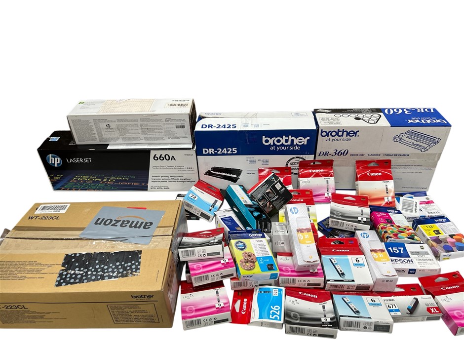 Assorted printer accessories, including ink cartridges, printer compartment
