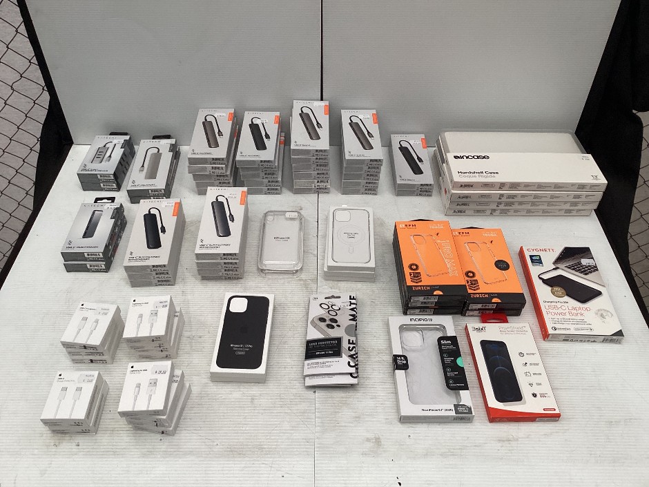 Box of Phone, iPad Cases and Connector Cables