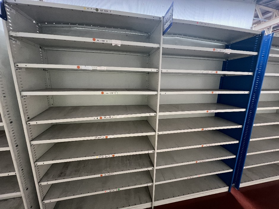 Double-bay metal shelving unit with adjustable shelf heights, double-sided