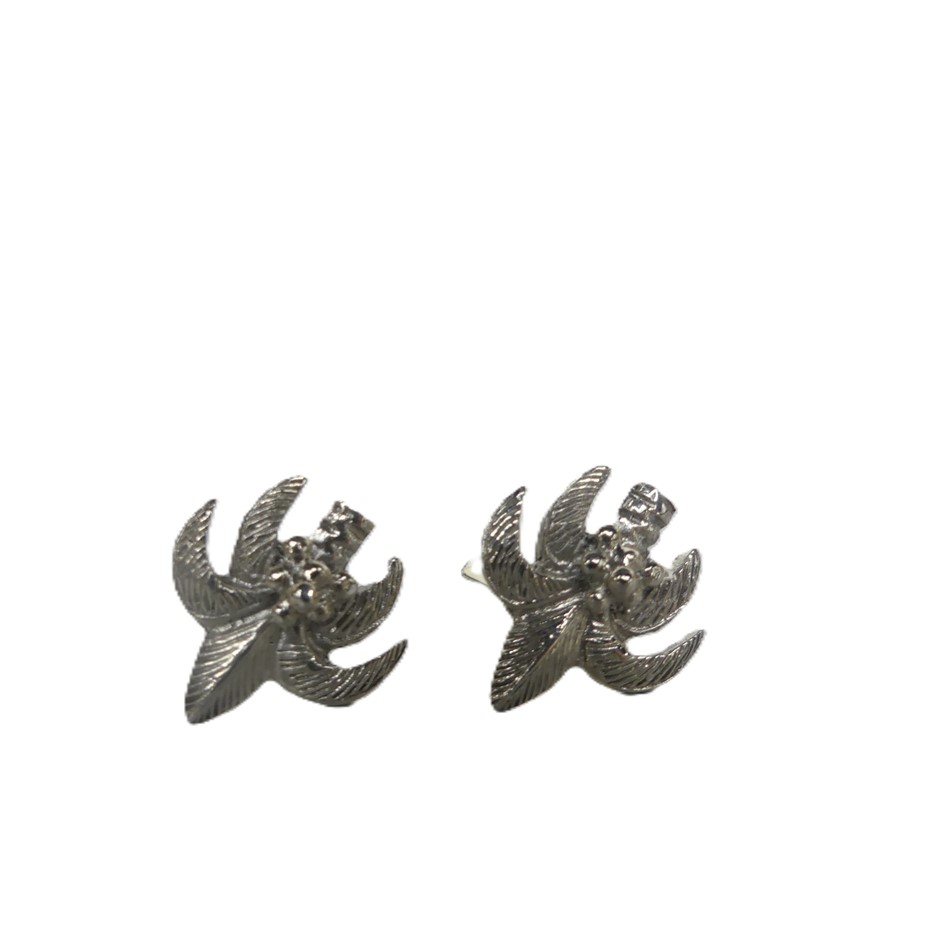 A Pair Of Silver Tone Metal Cufflinks