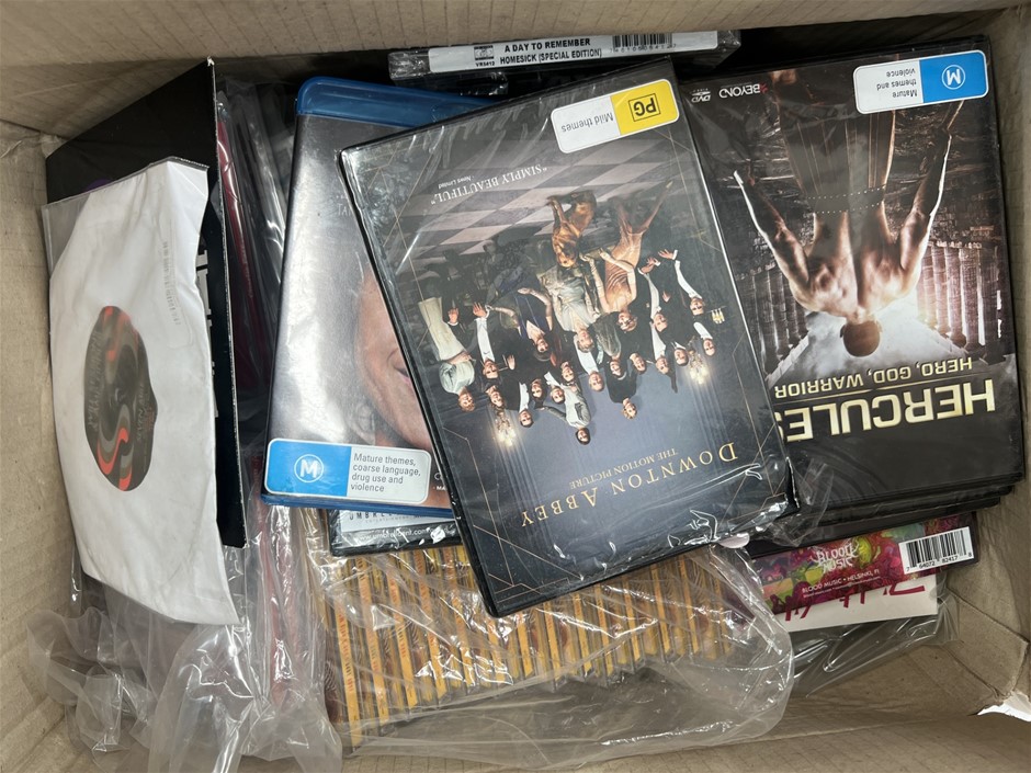 Assorted Box Of DVDs. NB: Photo as is. Some Not in Original Packaging, Some