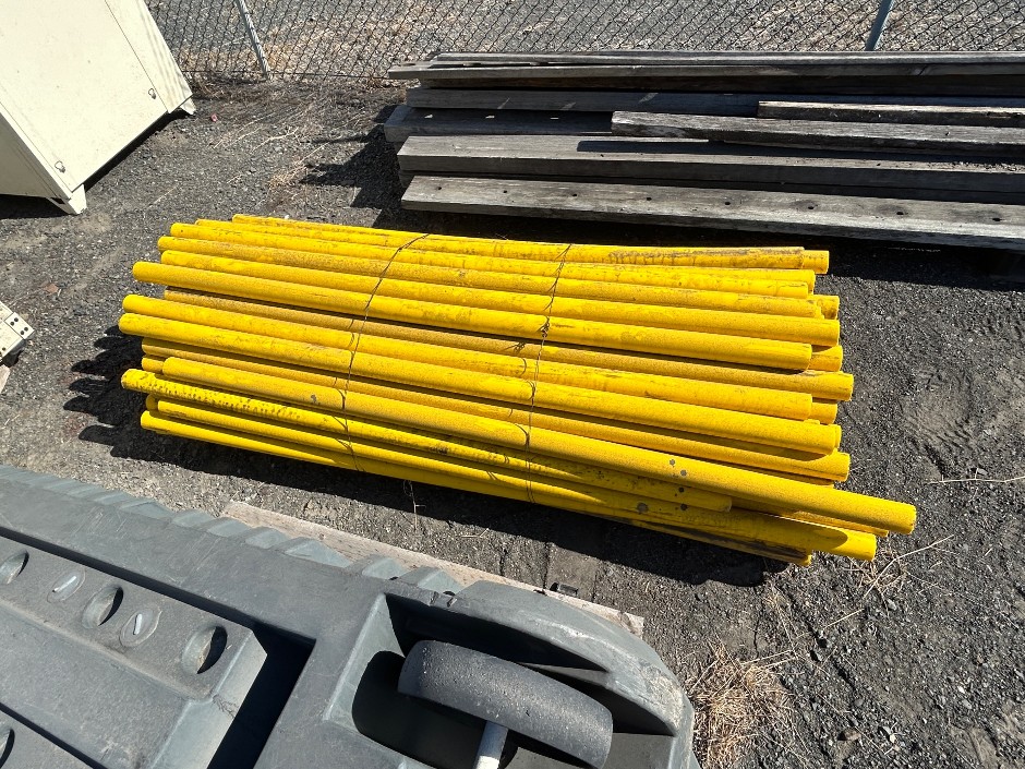 Pallet yellow poly pipe and poly trolley