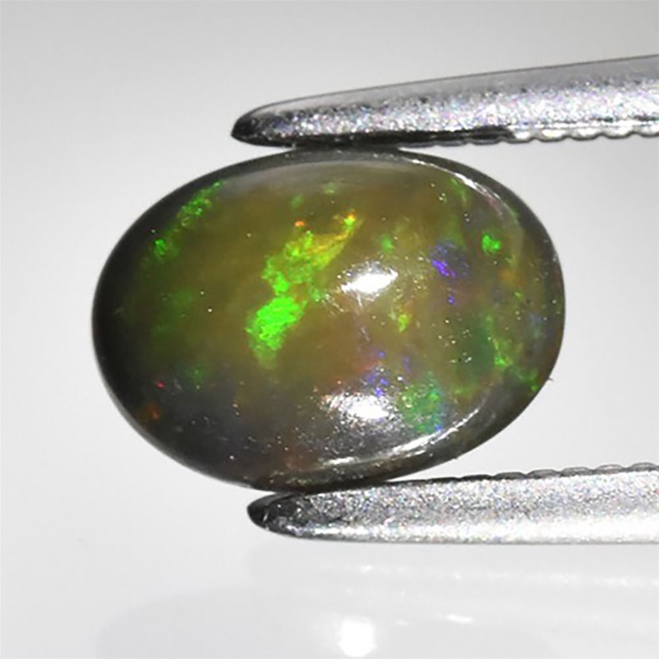 0.61ct Oval Cabochon Cut Play Of Color Black Opal Gemstones - 1Pc