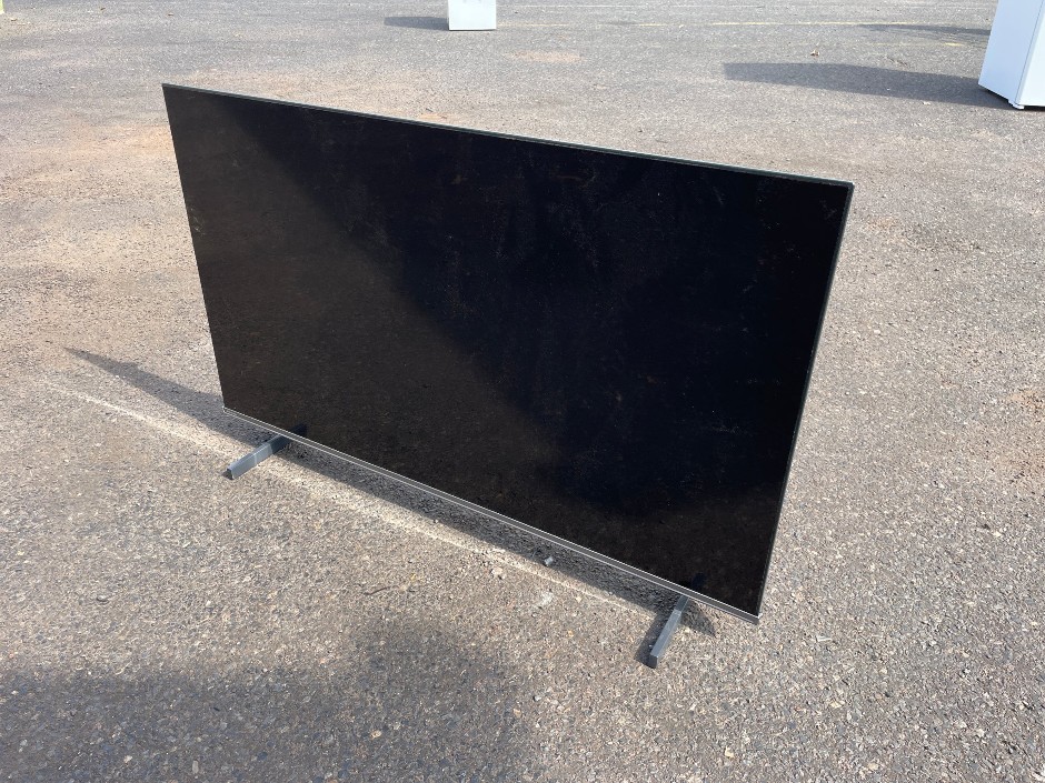 Large Flat Screen Television with Stand