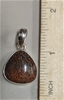 Sterling Silver pendant with FOSSIL DINOSAUR BONE Gemstone From Madagascar